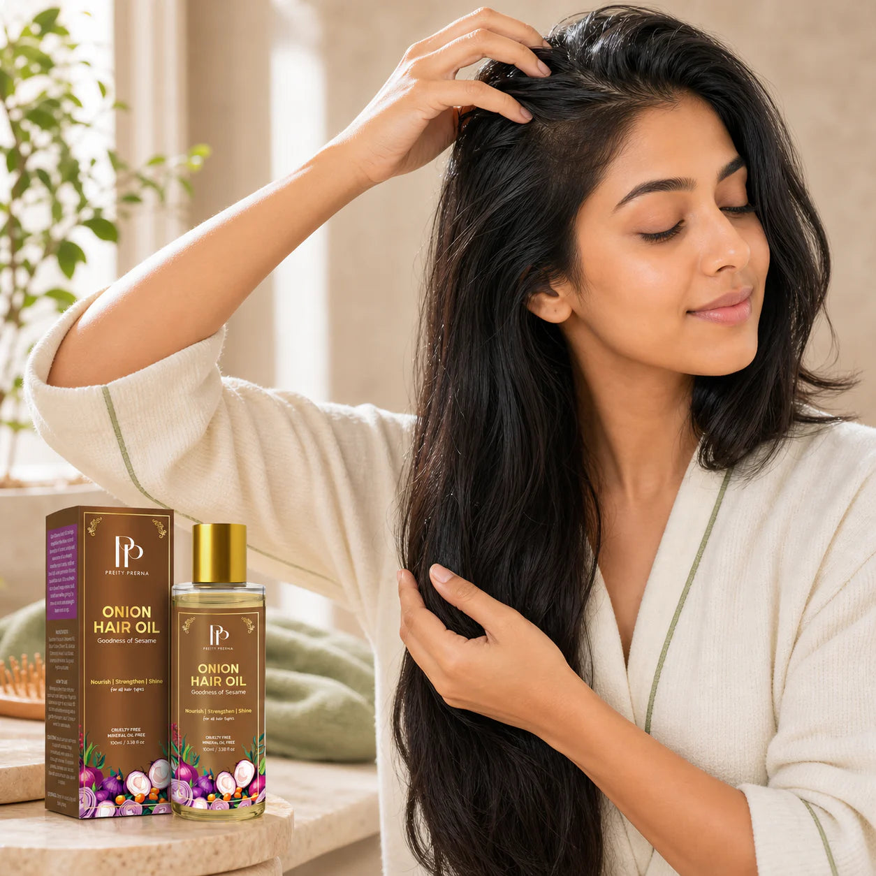 Massage Onion Hair Oil gently through scalp and lengths